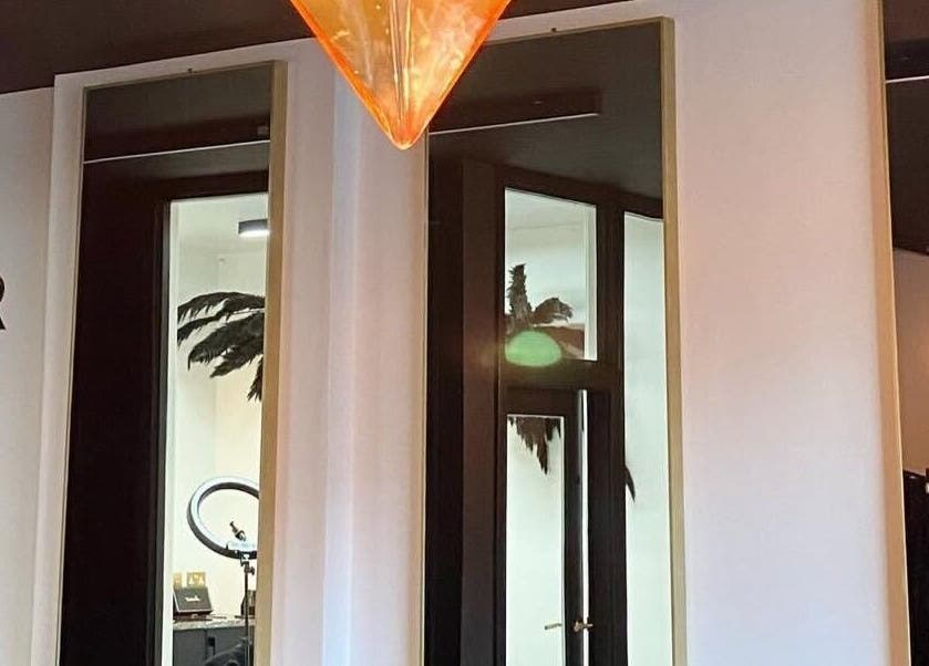 Chic interior at Justyna Gierej, Royton, Lancashire, GB with stylish mirrors and lighting.