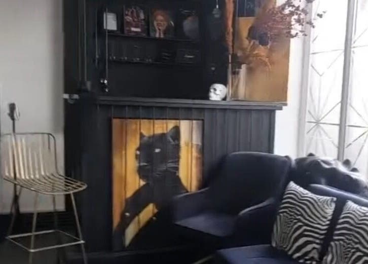 Elegant lounge at Justyna Gierej, Royton, Lancashire, GB with modern seating and artful decor.