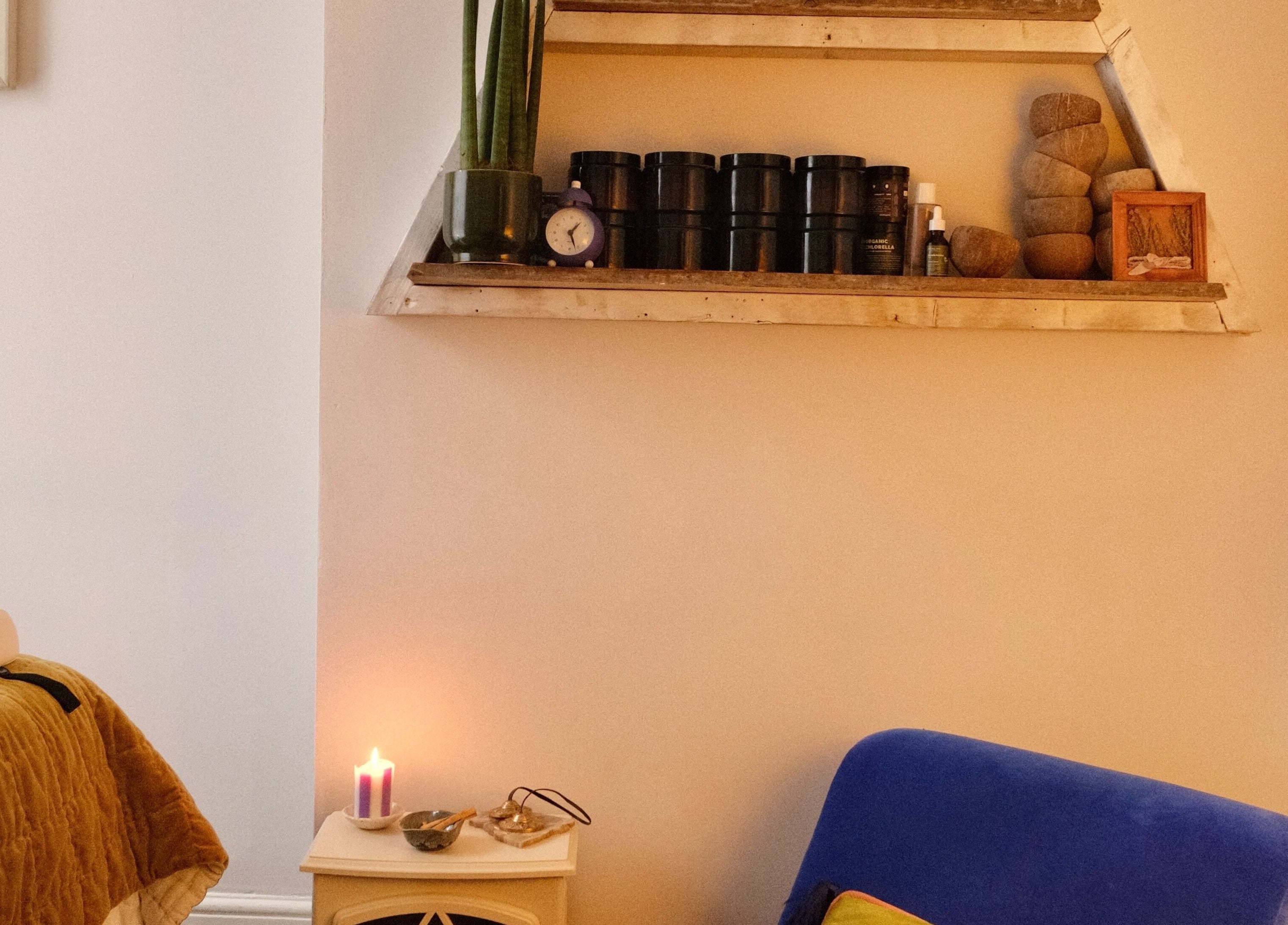 Relaxing room with candles and decor at Spell Holistic, Saint Leonards, England, GB.