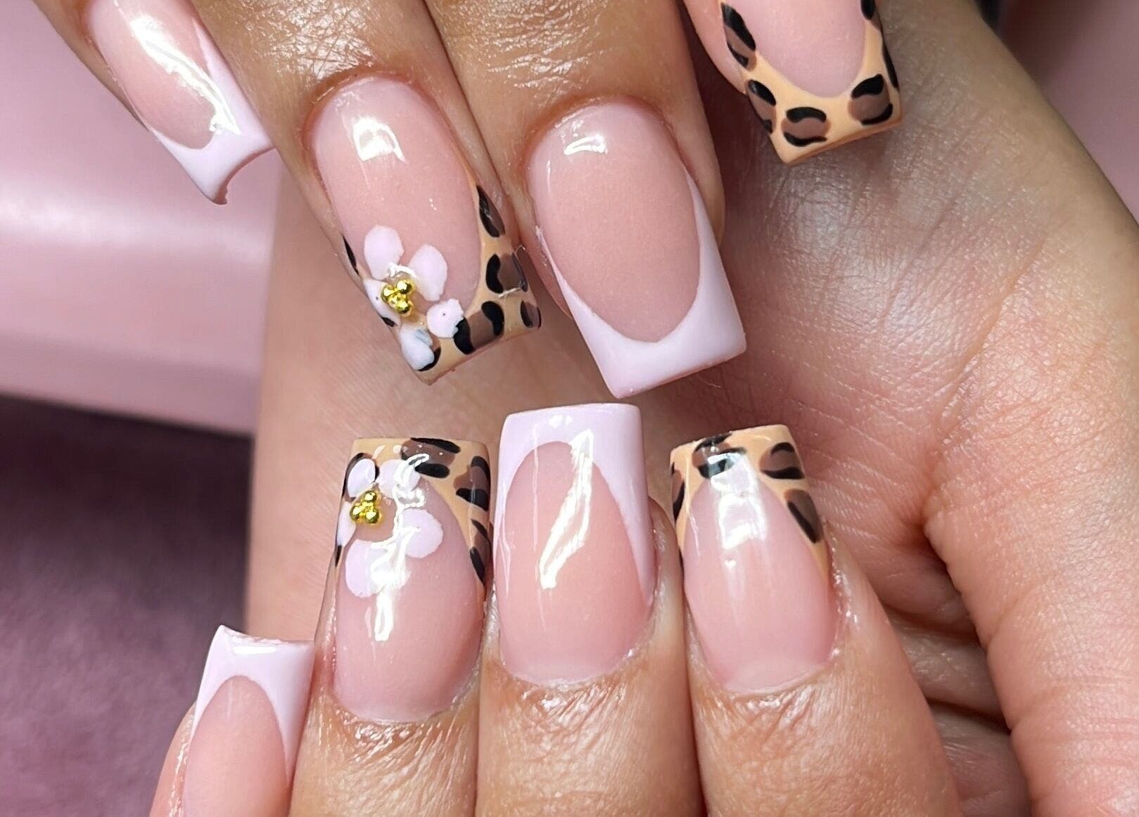 Elegant nail art with floral and leopard design by The Kee Effect, Boksburg, Gauteng, ZA.