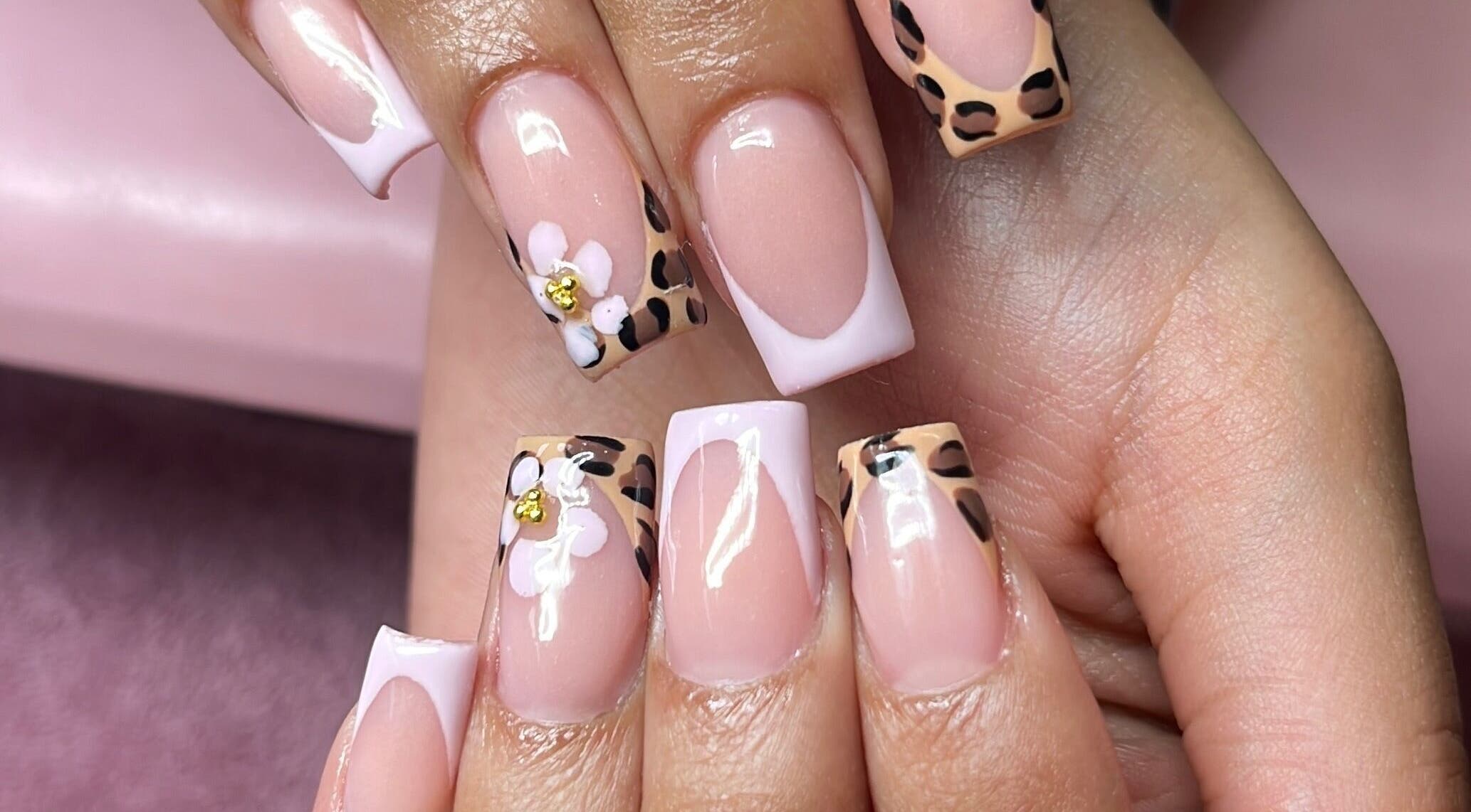 Elegant nail art with floral and leopard design by The Kee Effect, Boksburg, Gauteng, ZA.
