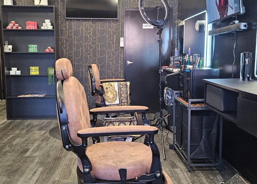 Modern interior of Ace Of Blades, Christchurch, Canterbury Region, NZ featuring styling chairs and tools.