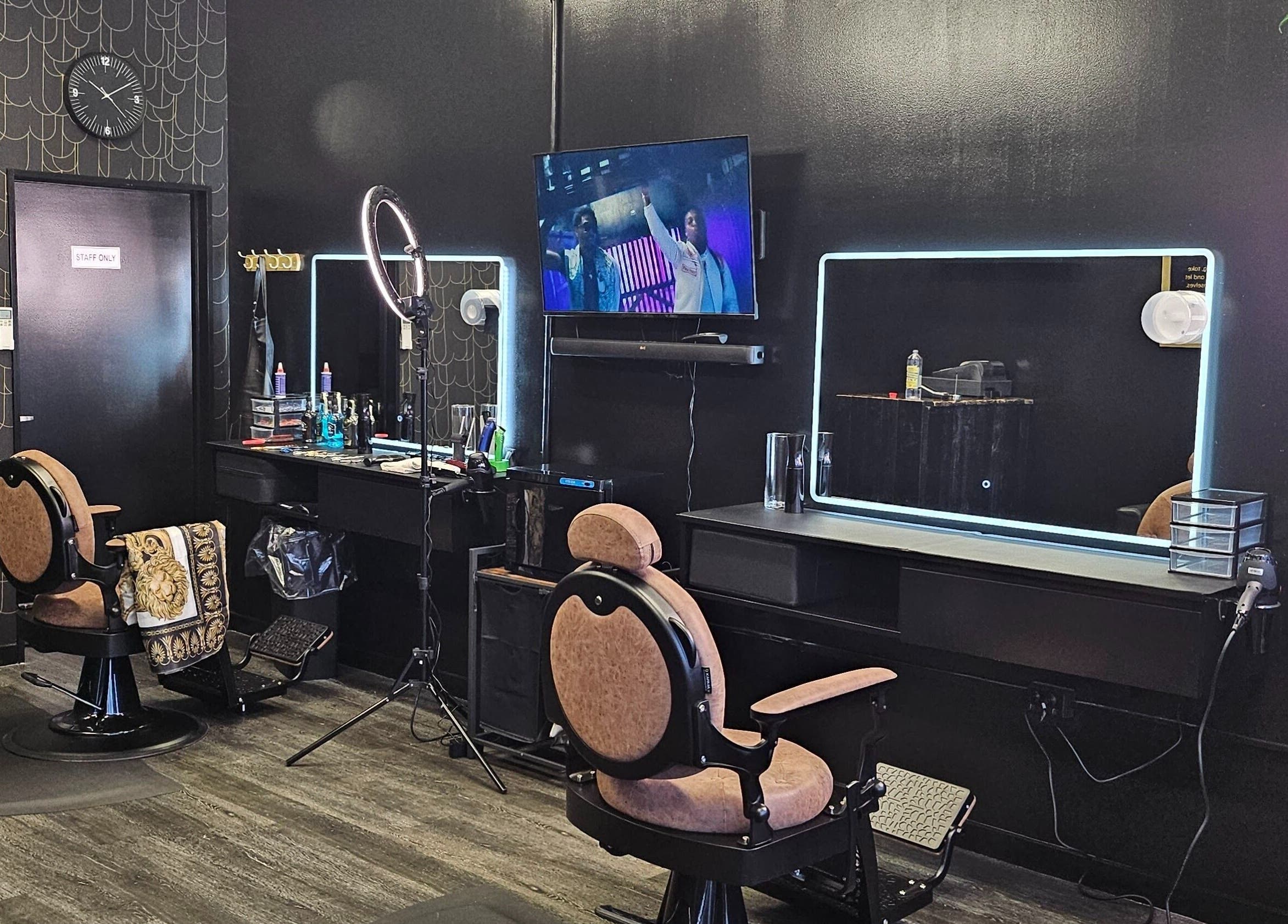 Modern interior of Ace Of Blades salon in Christchurch, Canterbury Region, NZ featuring sleek styling stations.