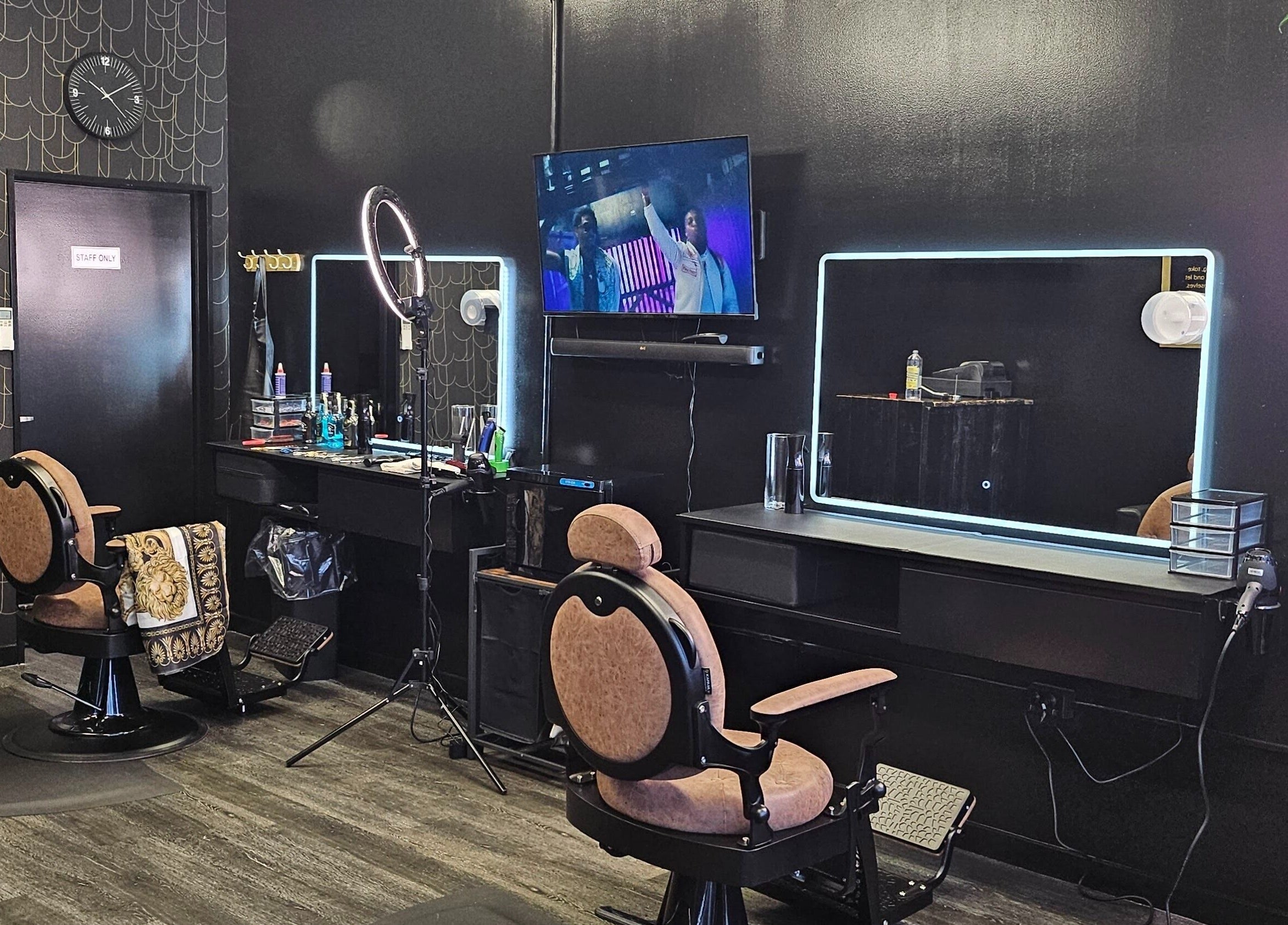 Modern interior of Ace Of Blades salon in Christchurch, Canterbury Region, NZ featuring sleek styling stations.