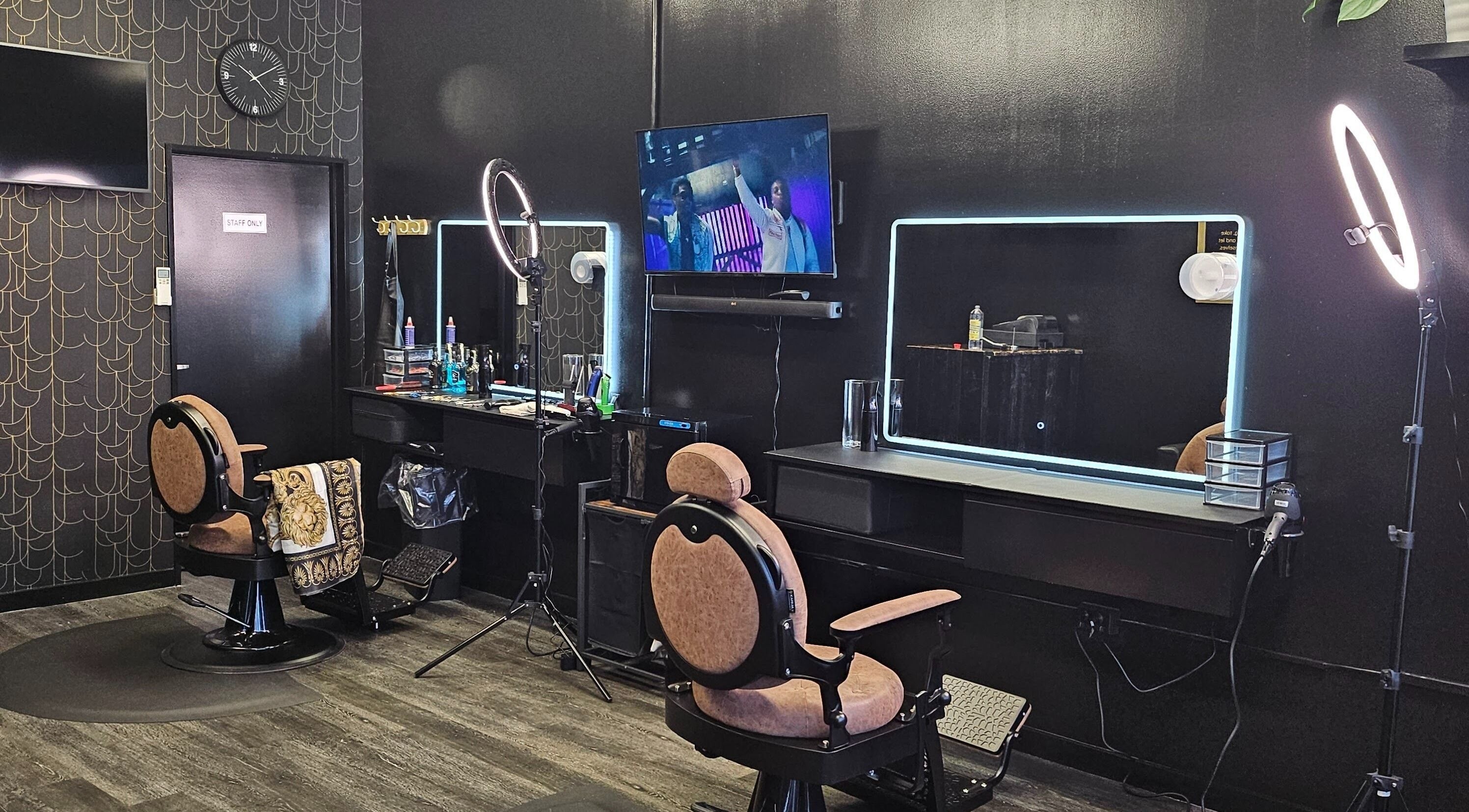 Modern interior of Ace Of Blades salon in Christchurch, Canterbury Region, NZ featuring sleek styling stations.