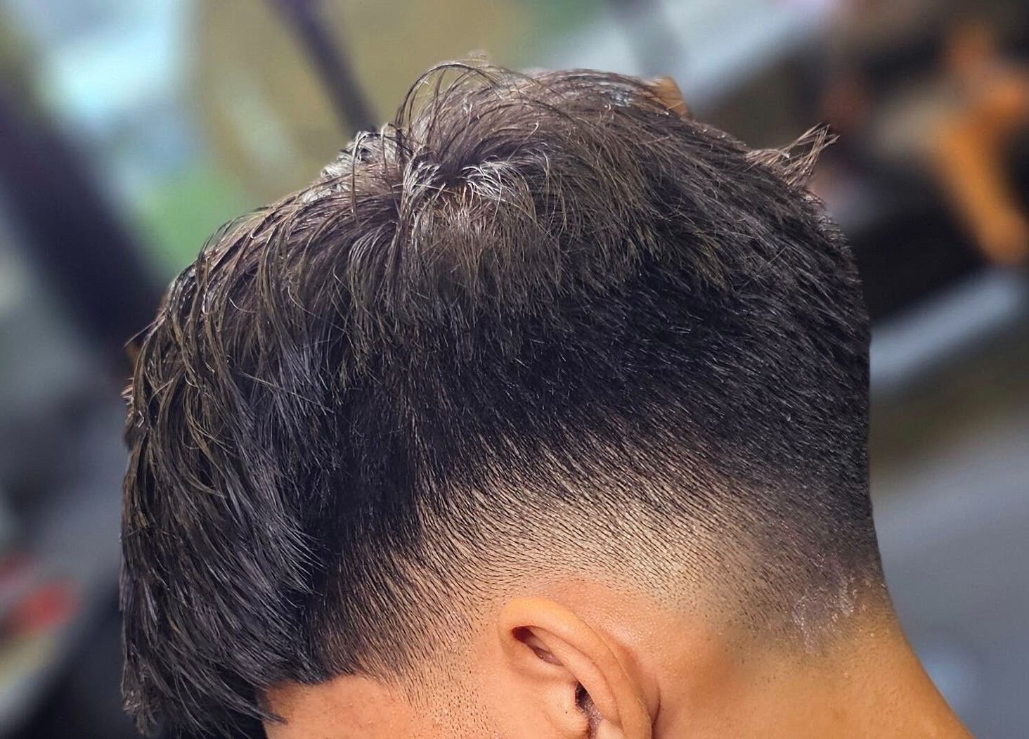 Close-up of a sleek fade haircut at Ace Of Blades, Christchurch, Canterbury Region, NZ.