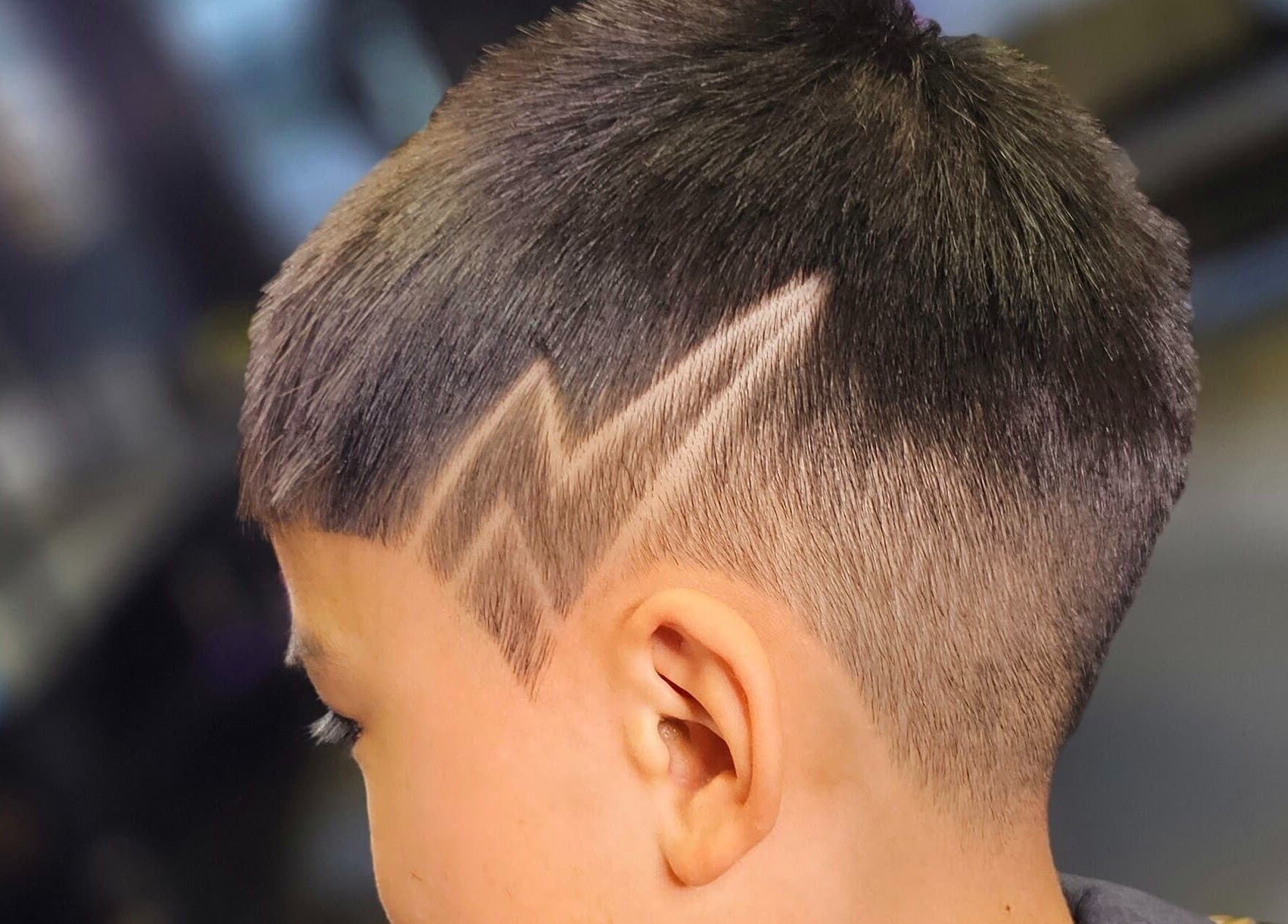 Close-up of a modern buzzcut with zigzag design at Ace Of Blades, Christchurch, Canterbury Region, NZ.