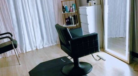 Modern salon chair and mirror at Sandra Trejos Marin, Melbourne, Victoria, AU.