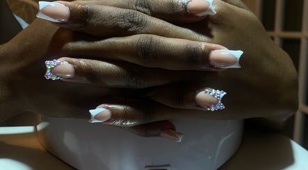 Elegant French nails with rhinestones at Nailedbyjazz, Freeport, Freeport, BS.