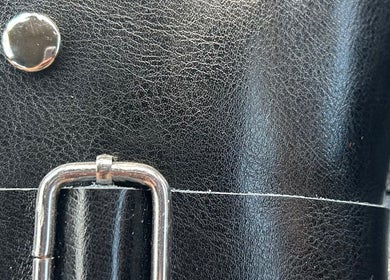 Close-up of sleek leather scissor sheath at Leearne - Elite Scissors, Griffith, Australian Capital Territory, AU.