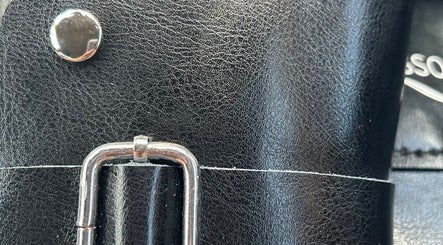 Close-up of a sleek leather case seen at Leearne - Elite Scissors, Griffith, Australian Capital Territory, AU.