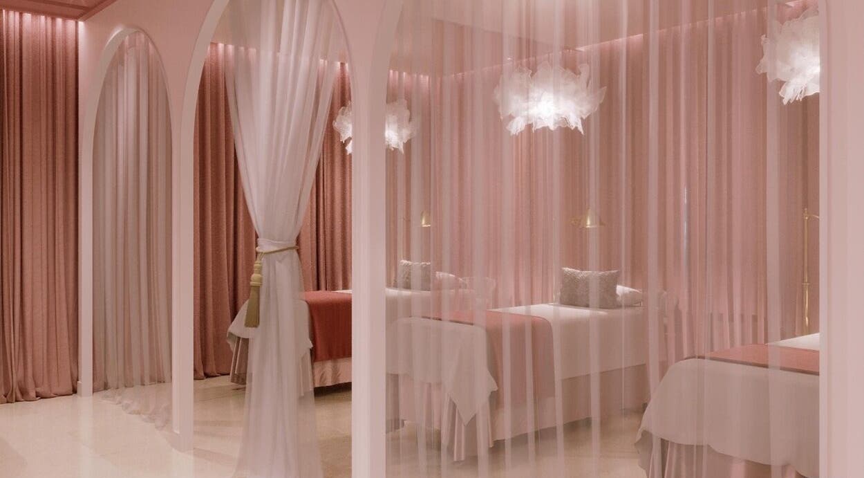 Elegant massage room at Linh Linh Beauty, Saint Albans, Victoria, AU, with soft pink curtains and cozy beds.
