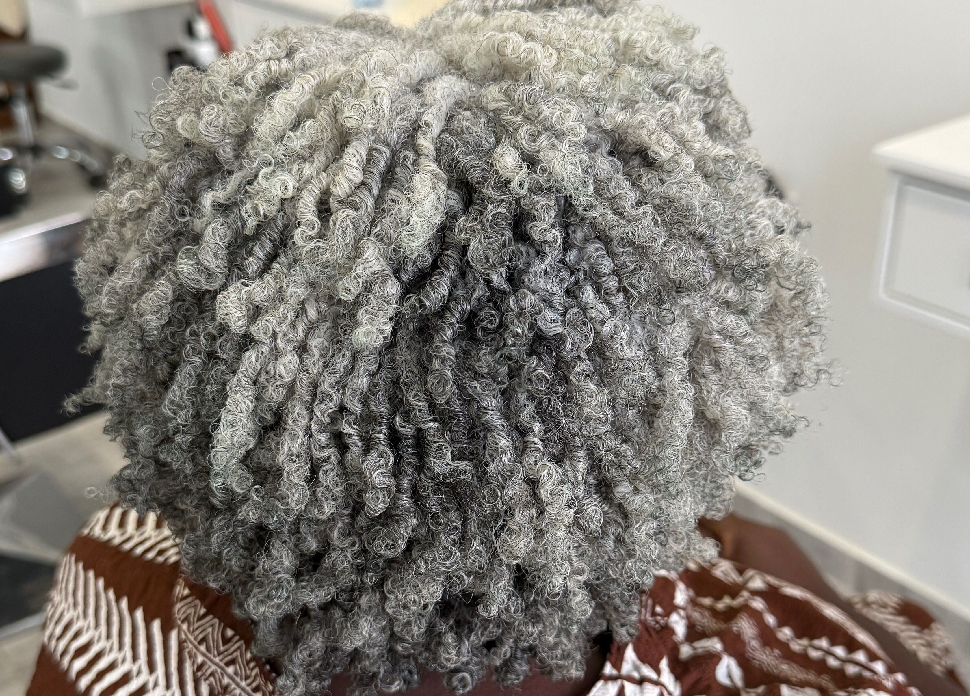 Beautifully styled gray curls at TMP’s Hair Care, Paramaribo, Paramaribo, SR.