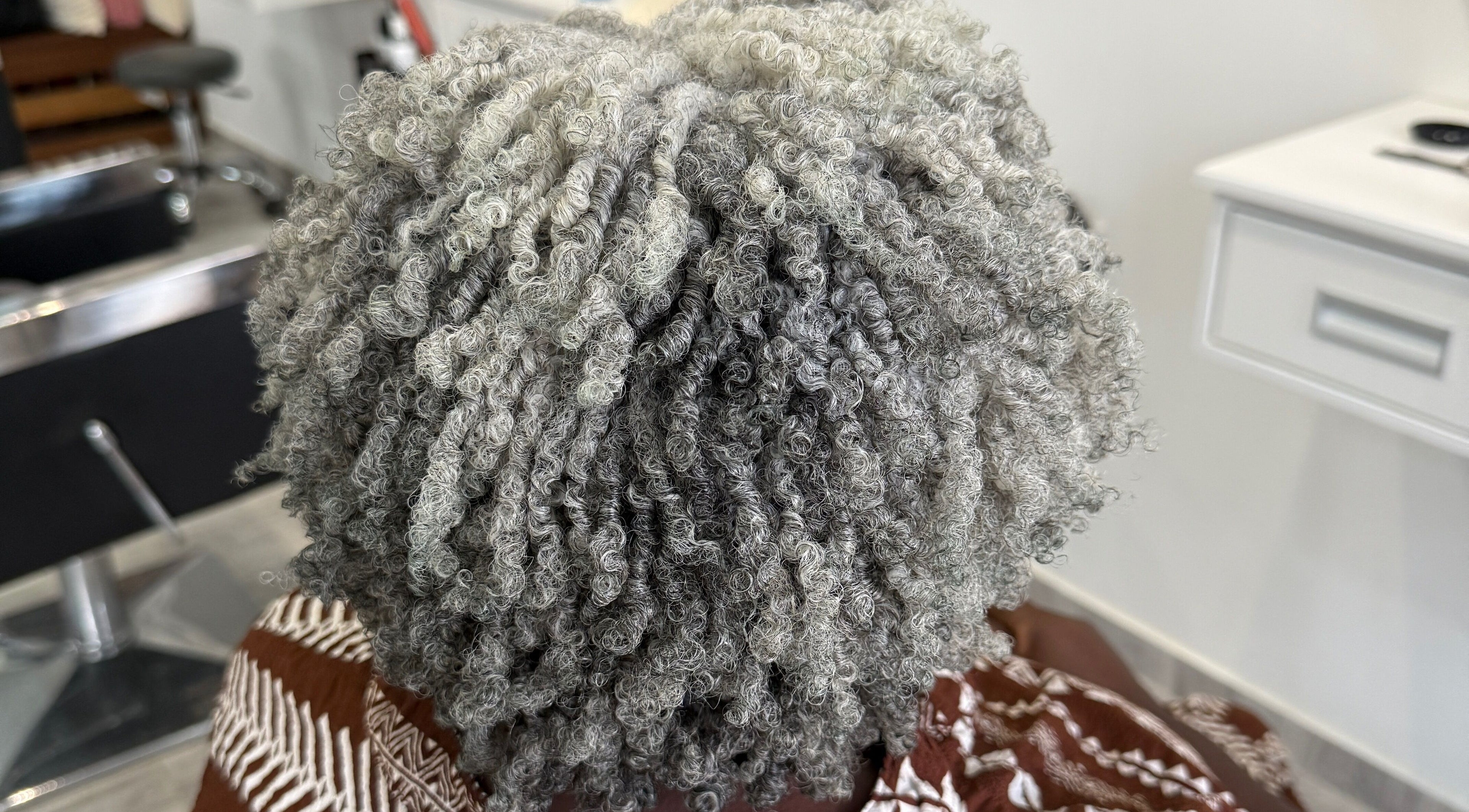 Beautifully styled gray curls at TMP’s Hair Care, Paramaribo, Paramaribo, SR.