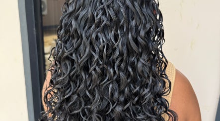 Beautiful curly hairstyle at TMP’s Hair Care, Paramaribo, Paramaribo, SR, showcasing vibrant texture.