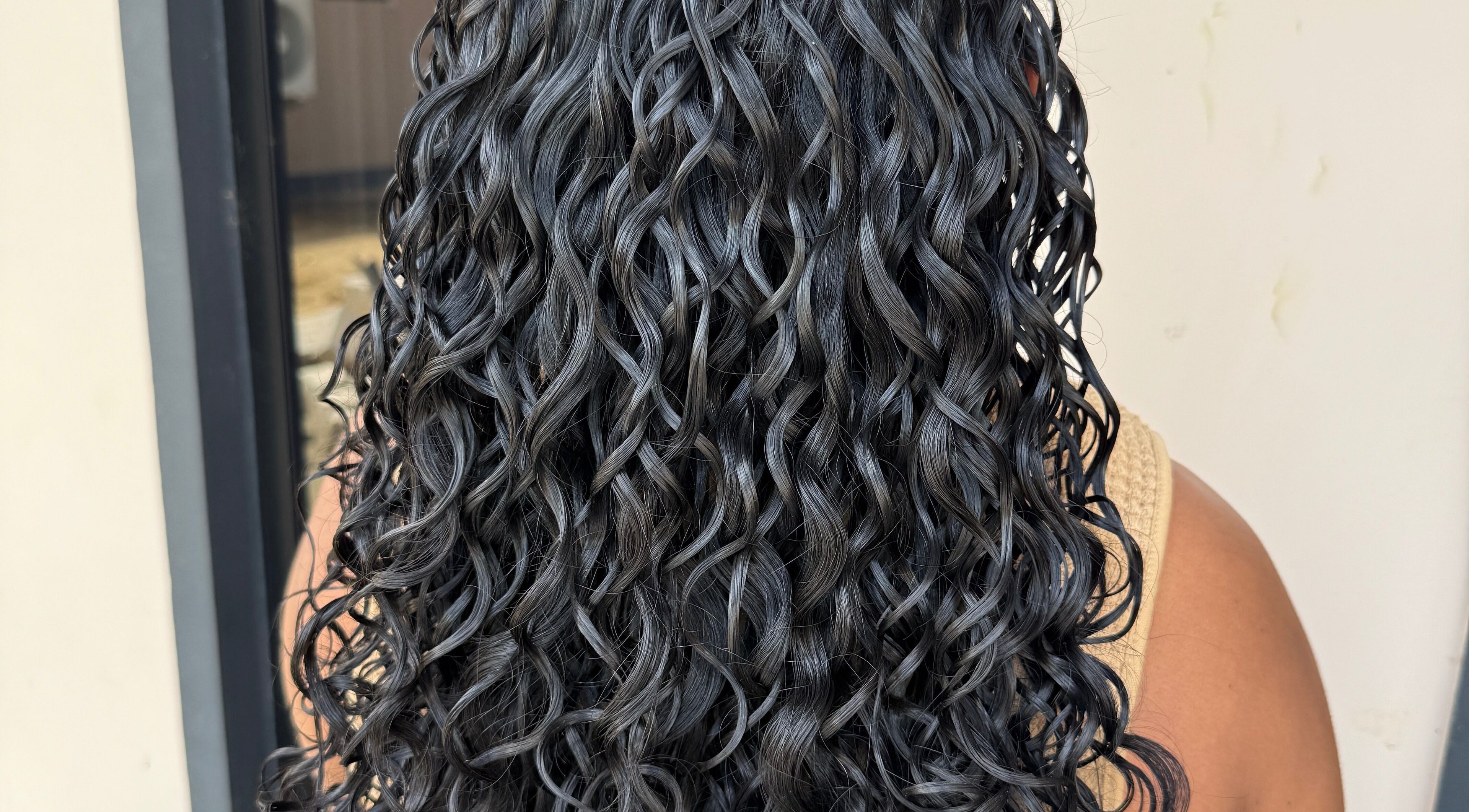 Beautiful curly hairstyle at TMP’s Hair Care, Paramaribo, Paramaribo, SR, showcasing vibrant texture.