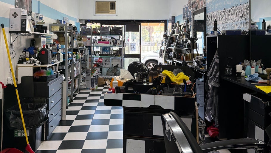 Interior of FirstclassBarbersSyd, a stylish barbershop in Fairfield, New South Wales, AU with modern decor.