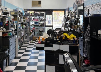 Interior of FirstclassBarbersSyd, a stylish barbershop in Fairfield, New South Wales, AU with modern decor.