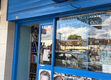 Front view of a vibrant hair salon at FirstclassBarbersSyd, Fairfield, New South Wales, AU.