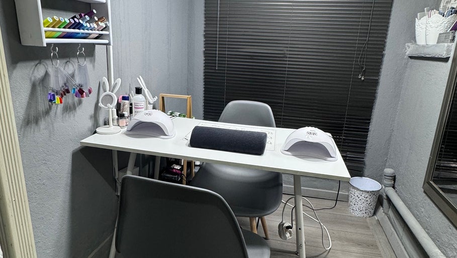 Modern nail station at Taylored Nails, Mbombela, Mpumalanga, ZA, featuring stylish decor and nail tools.