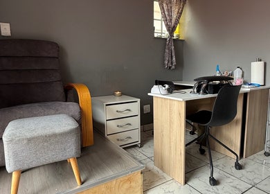 Visit Taylored Nails in Mbombela, Mpumalanga, ZA for a relaxing nail care experience in a cozy setting.