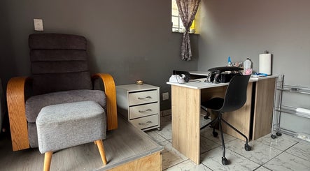 Visit Taylored Nails in Mbombela, Mpumalanga, ZA for a relaxing nail care experience in a cozy setting.