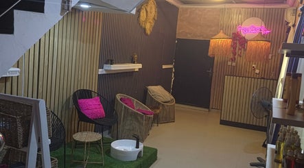 Welcoming interior of Seasom Spa in Lekki, Lagos, NG featuring cozy seating and warm lighting.