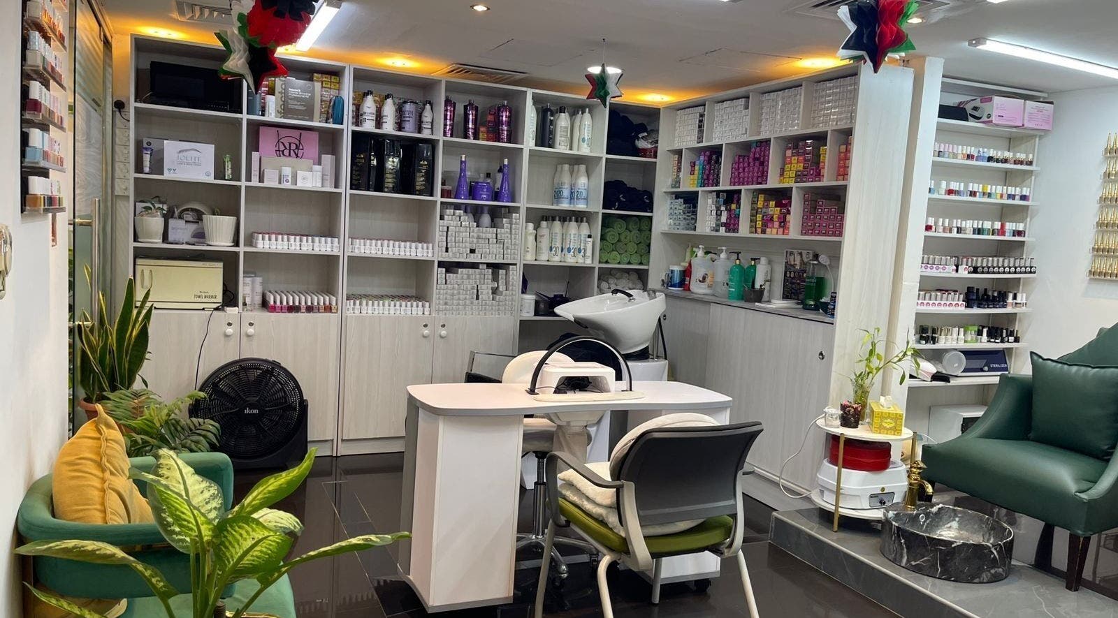 Elegant interior of Beauty Garden Lady Salon in Abu Dhabi, AE with plush seating and extensive product display.