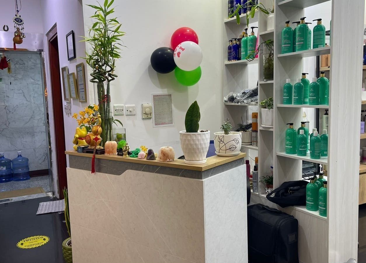 Reception area of Beauty Garden Lady Salon, Abu Dhabi, featuring products and decor.