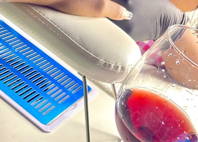 Manicure at Nya_nailluxury in Bridgetown, Saint Michael, BB, with wine and armrest view.