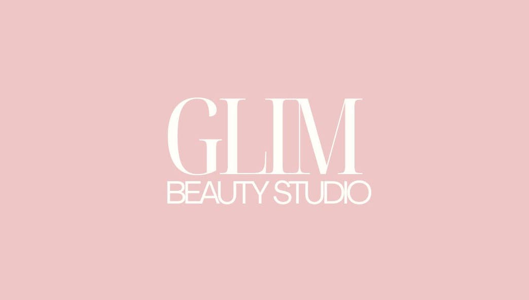 Elegant GLIM Beauty Studio logo on a soft pink background, located in Chelmsford, England, GB.