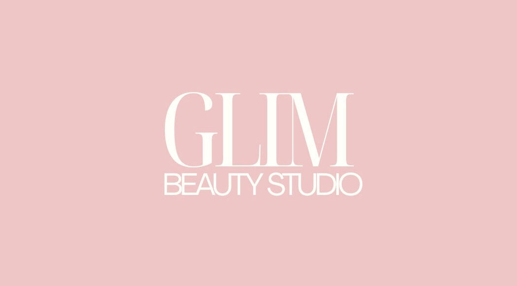 Elegant GLIM Beauty Studio logo on a soft pink background, located in Chelmsford, England, GB.
