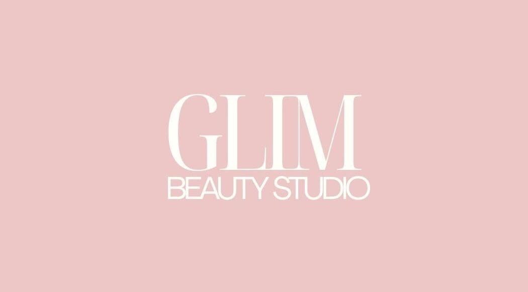 Logo of GLIM Beauty Studio in Chelmsford, England, GB featuring elegant text on a pink background.
