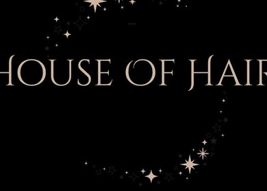 Elegant logo of The House of Hair in Wolverhampton, England, GB with starry design on black background.