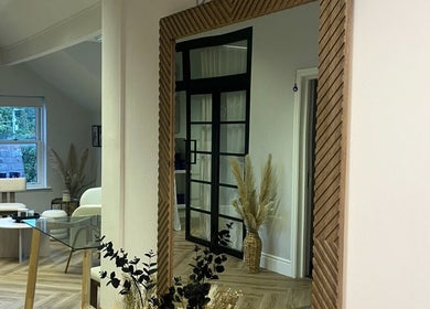 Modern interior of Rebecca Slane Skin in Alderley Edge, England, GB featuring a stylish mirror.