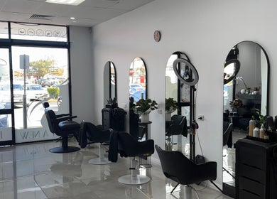 Chic interior of Gorgeous by Mary salon in Felixstow, South Australia, AU featuring modern styling stations.