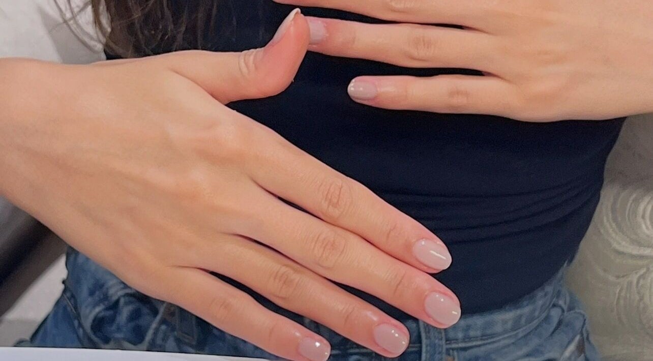 Elegant nude nails at Glamorous Salon جلامورس صالون, Riyadh, SA, showcasing professional manicure art.