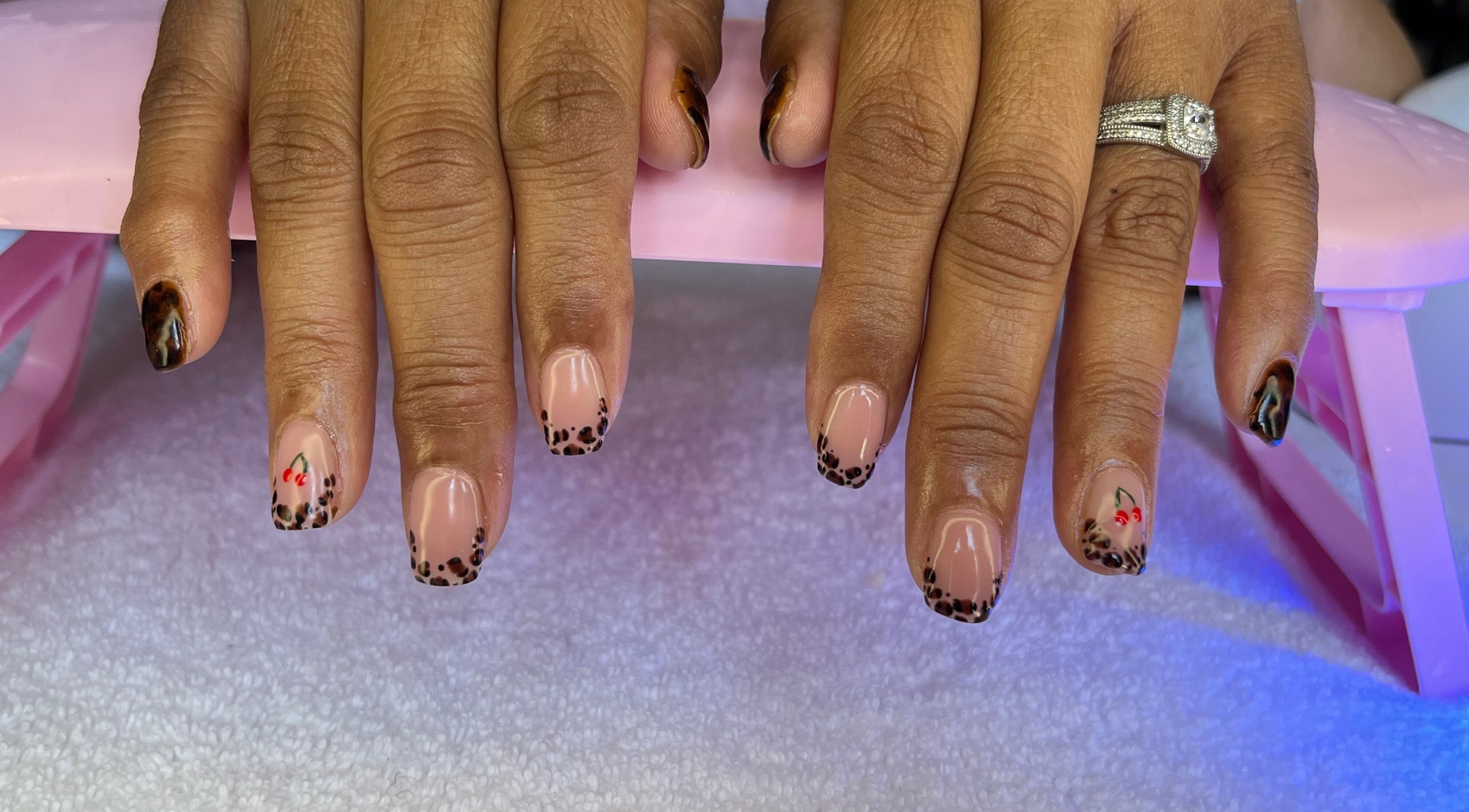Stylish leopard nail art at Nailed by Nay, Cape Town, Western Cape, ZA. Stunning design on well-groomed nails.