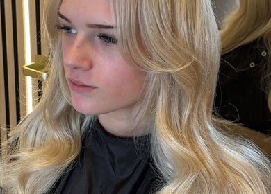 Stylish blonde hair highlight at Colours by Courts, Glasgow, Scotland, GB.