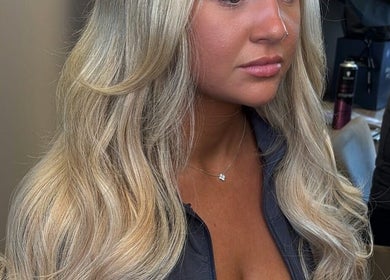 Stylish blonde waves styled at Colours by Courts in Glasgow, Scotland, GB.