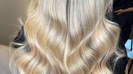 Blonde wavy hairstyle at Colours by Courts, Glasgow, Scotland, GB. Perfect highlights and styling.