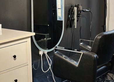 Modern styling chair and mirror at Elena Manea - Beauty Room, Leadenhall, England, GB.