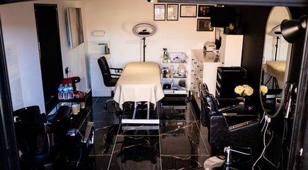 Luxurious treatment room at Elena Manea - Beauty Room, Leadenhall, England, GB with sleek decor and modern amenities.