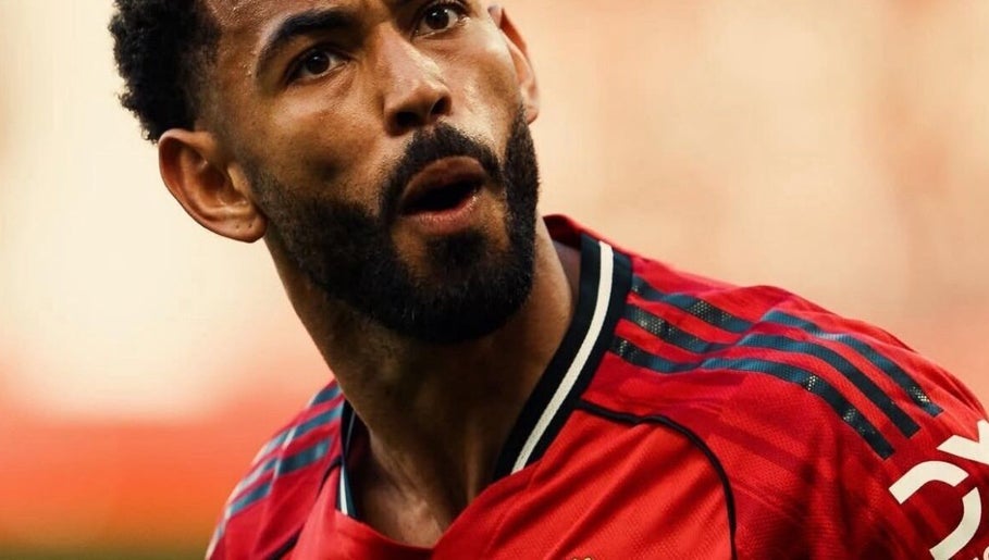 Client with a styled beard at THE SLICK BARBERS, Nairobi, Nairobi County, KE showing a bold expression.