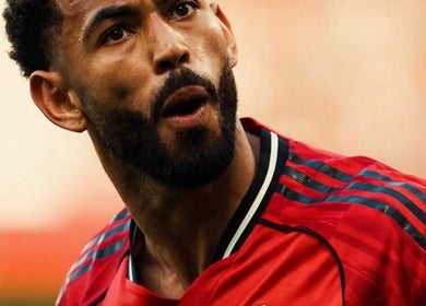 Client with a styled beard at THE SLICK BARBERS, Nairobi, Nairobi County, KE showing a bold expression.