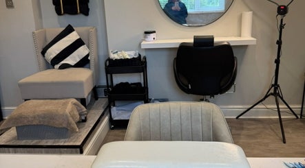 Elegant treatment room at The Beauty Bar Swansea in Llansamlet, Wales, GB, showcasing modern decor.