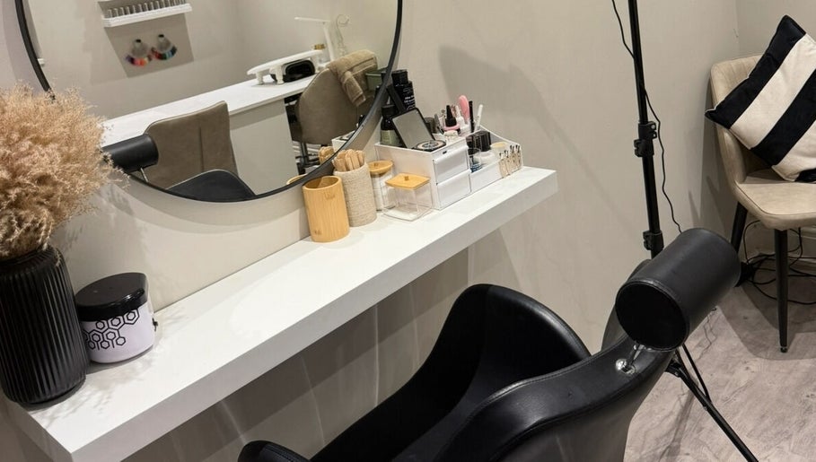 Stylish styling station at The Beauty Bar Swansea, Llansamlet, Wales, GB with chair and mirror setup.