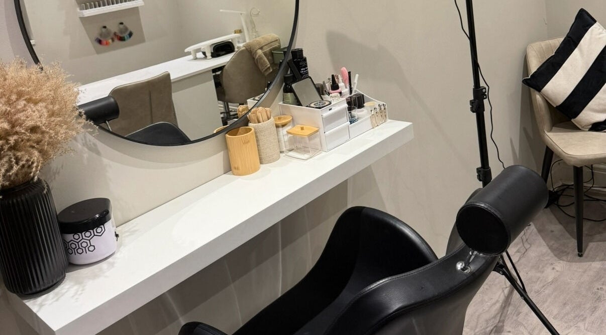Stylish styling station at The Beauty Bar Swansea, Llansamlet, Wales, GB with chair and mirror setup.