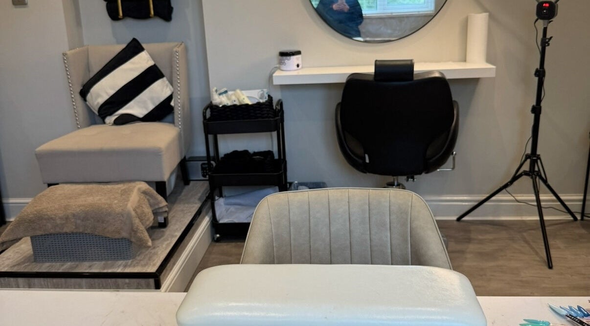 Modern makeup station at The Beauty Bar Swansea, Llansamlet, Wales, GB with stylish seating and elegant decor.