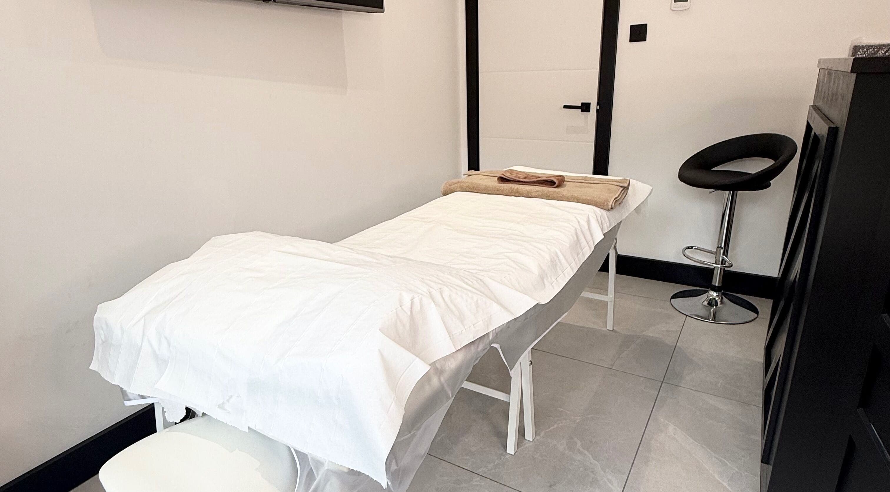 Calming treatment room at Secret Bodies by Anna in Poole, England, GB with a massage table and serene decor.